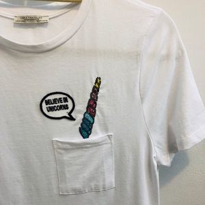 White pocket t-shirt with unicorn horn